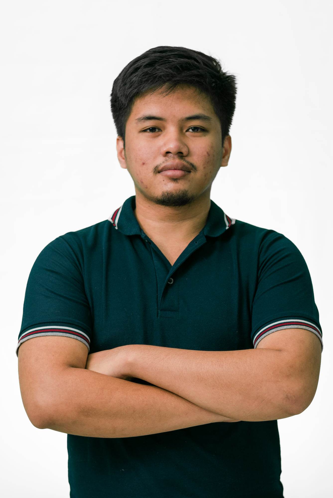Chritian in crossed arms.